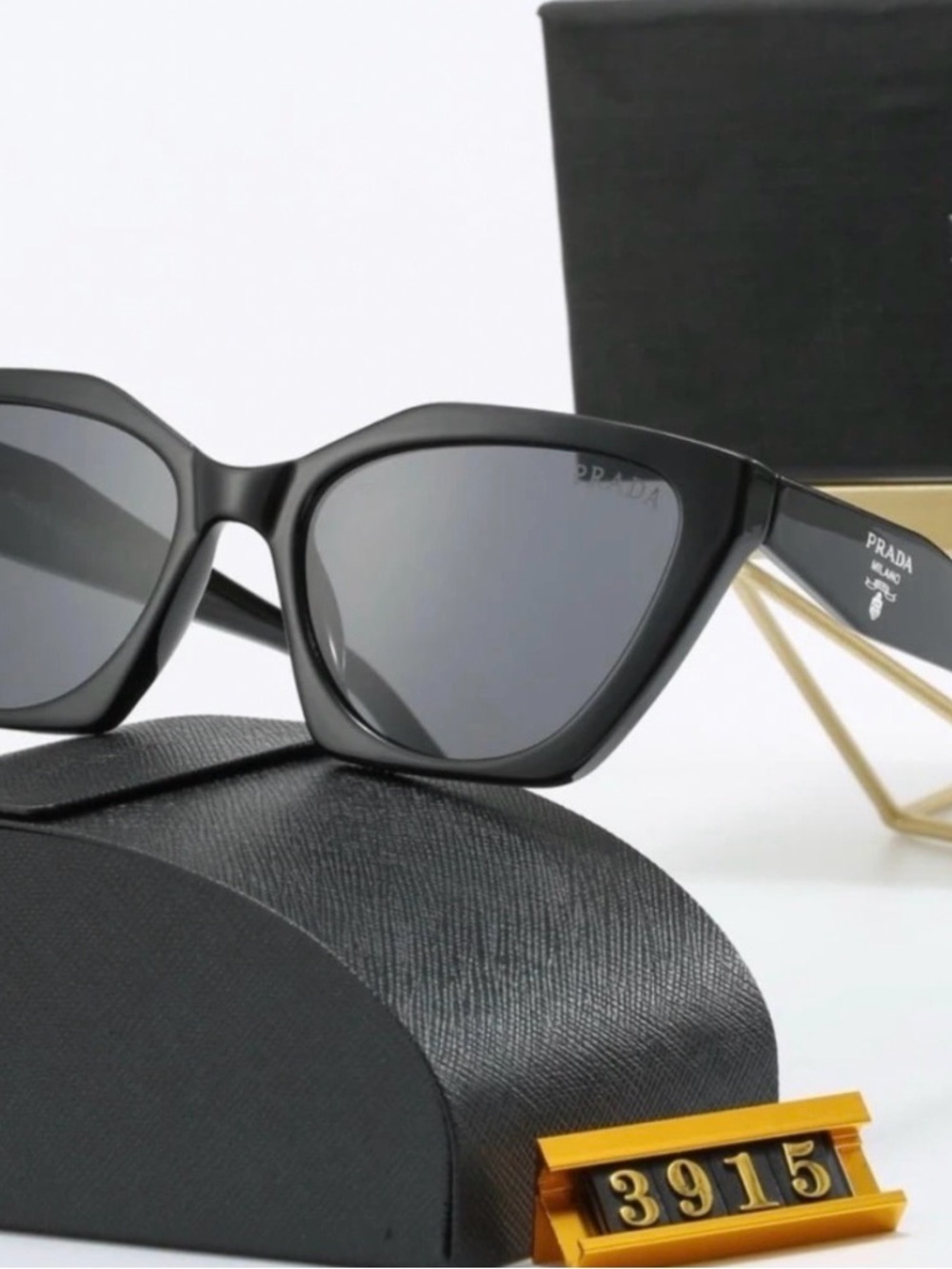 Prada Black Cat-Eye Sunglasses with Dark Gray Lenses